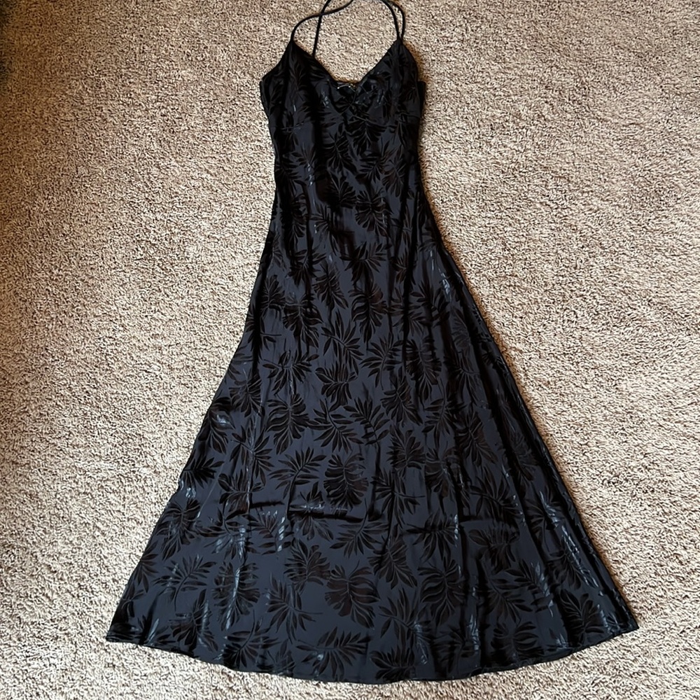 D. ark Strappy Black Dress